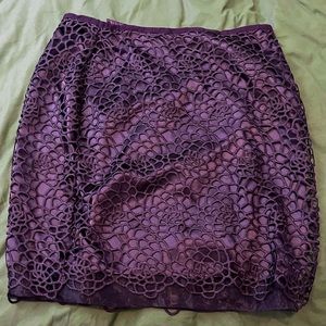 Dark purple skirt with overlay